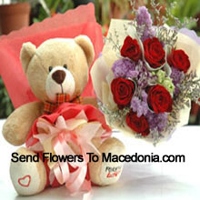Bunch Of 7 Red Roses And A Medium Sized Cute Teddy Bear Delivered in Macedonia