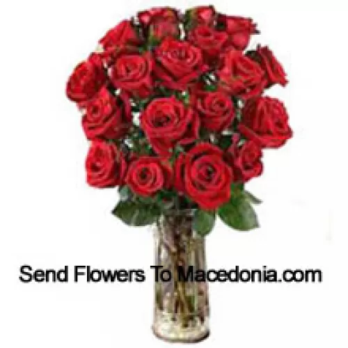 19 Red Roses With Some Ferns In A Vase
