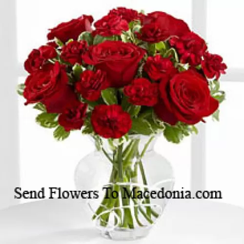 9 Red Roses And 8 Red Carnations In A Glass Vase
